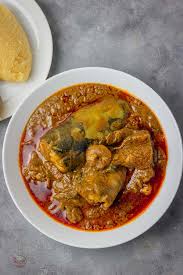 Banga soup, swallow with Catfish 